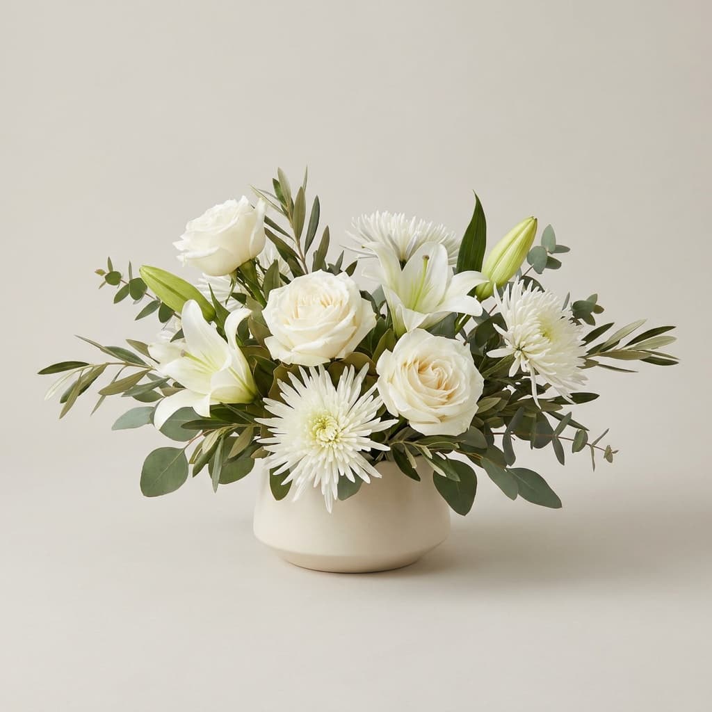 A white arrangement on a reception desk